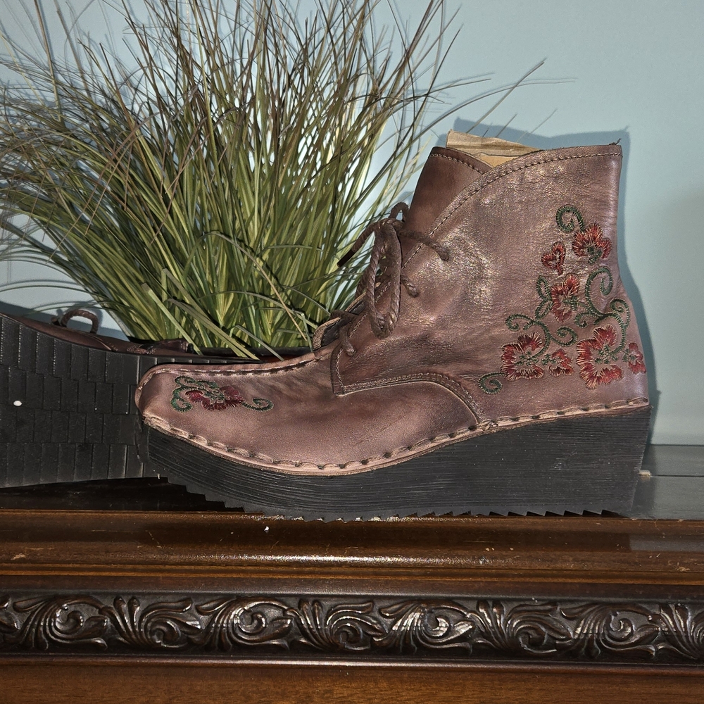 Brown Lace Up Boots with Thick Sole and Intricate Design